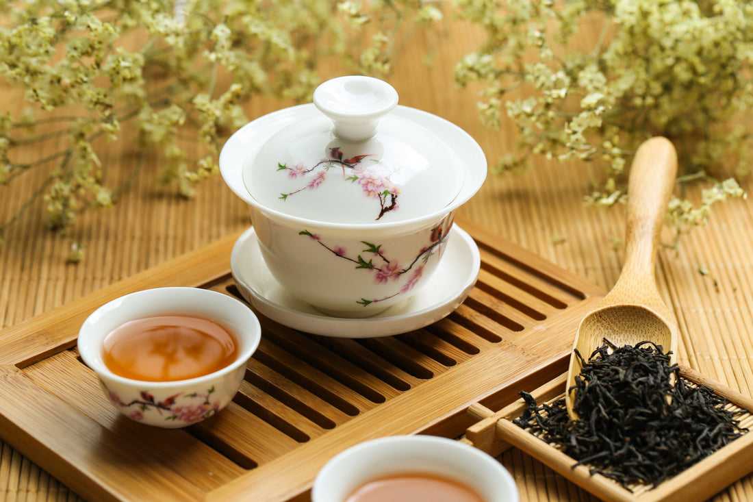 Blooming flower tea in a glass gaiwan at Dragon Girl Tea in Buffalo, NY