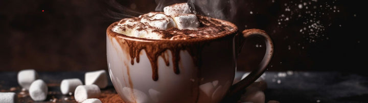Hot chocolate with marshmallows and chocolate drizzle in a white mug on a dark background
